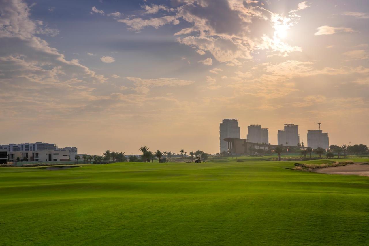 Radisson Dubai Damac Hills Hotel Bagian luar foto