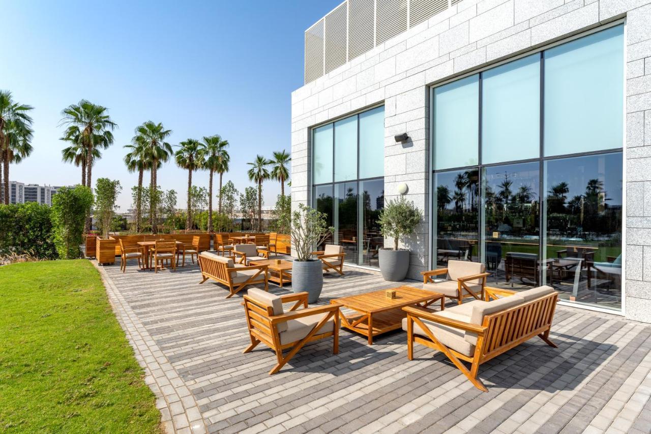 Radisson Dubai Damac Hills Hotel Bagian luar foto