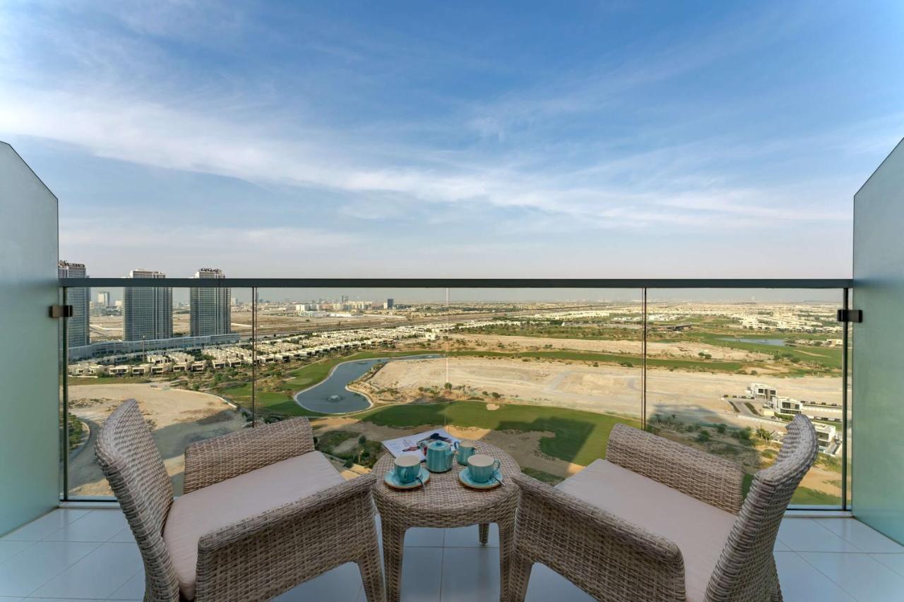 Radisson Dubai Damac Hills Hotel Bagian luar foto