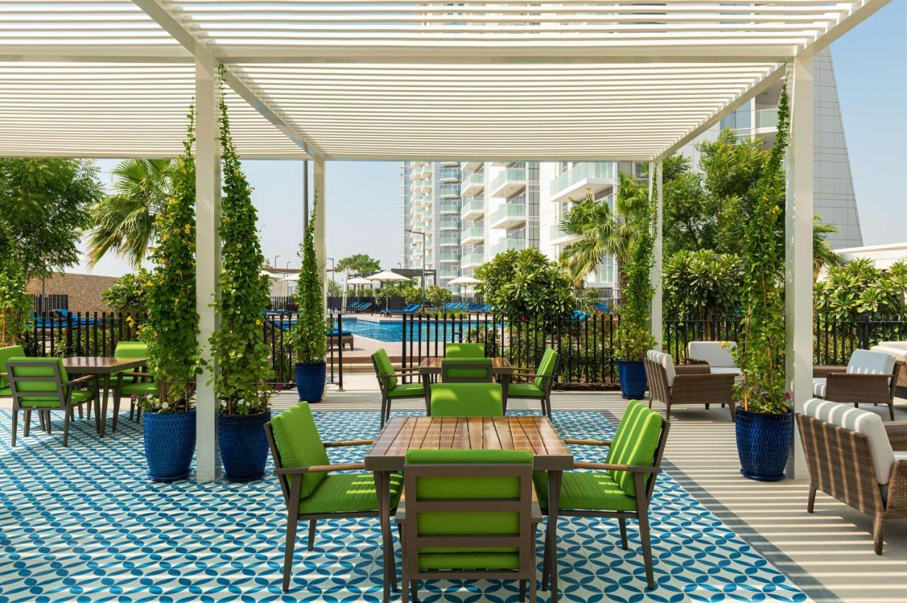 Radisson Dubai Damac Hills Hotel Bagian luar foto